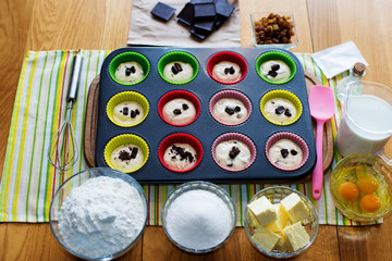 preparation of muffins , the ingredients for delicious homemade cakes