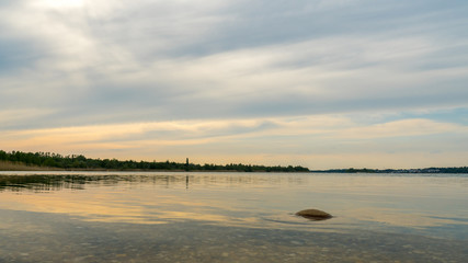 Stony sunset beach at the Markkleeberger Lake near Leipzig 