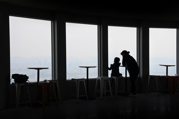 Mom and her son at a tower