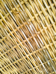 Bamboo dry sheet curtain tied with light wood tone background. Texture