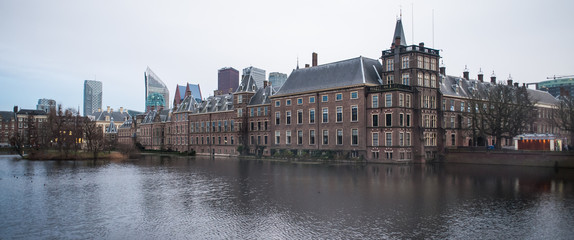 Water building reflection of Binnenhof palace, in the Hague, Netherlands. Dutch Parliament