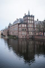 Water building reflection of Binnenhof palace, in the Hague, Netherlands. Dutch Parliament