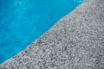Pure blue water the pool. Water caustic background