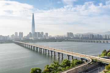 Awesome view of Jamsil Railway Bridge and scenic skyscraper