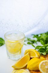 Tradition Summer drink mojito with lime and mint. Top view with copy space.