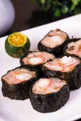 a Philippine made Japanese siomai; ground pork with crab stick wrapped in nori 