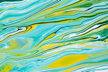 Fluid art texture. Abstract background with iridescent paint effect. Liquid acrylic picture with...