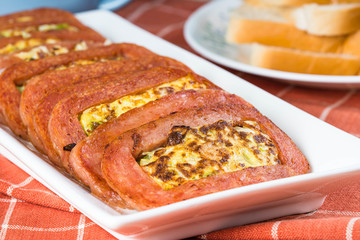 meat loaf with fried scrambled egg with cabbage