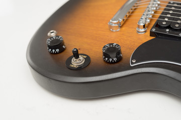 Electric Guitar detail of input jack and volume and tone controls ideal for music lessons signs