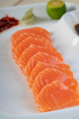fresh salmon sashimi with wasabi and soy sauce