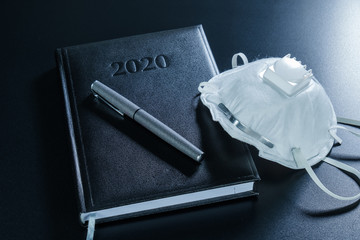 Business in Zeiten von Corona-Virus: Maske / Mundschutz / Corona Maske auf Jahresplaner / Kalender...