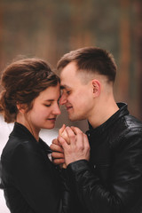 couple in love gently hugs and snuggles together