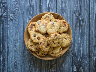 Shortbread with dates on a dark wooden surface