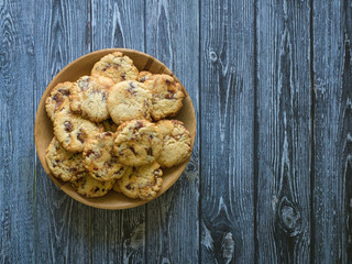 Shortbread with dates on a dark wooden surface