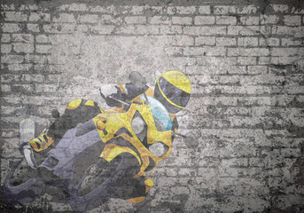 Grunge decayed faded brick wall background with motorbike and rider with copy space for own text  