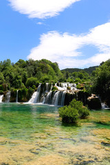 Beautiful waterfalls in National Park Krka, Croatia on a sunny summer day. 