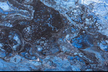 Acrylic  abstract background. Blue paint with silver