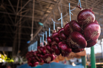 Red onions sold in the market