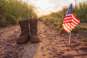 military boots with the united states flag in the field