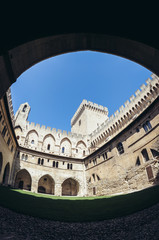 Fototapeta na wymiar Courtyard of Palace of the Popes historical palace located in Avignon, Southern France