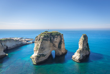 View on the Rock of Raouche also called Pigeon Rock in Beirut, capital city of Lebanon - obrazy, fototapety, plakaty