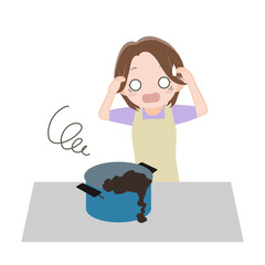 料理で失敗をして慌てる女性