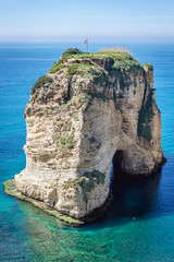 Rock of Raouche also called Pigeon Rock in Beirut, capital city of Lebanon - obrazy, fototapety, plakaty