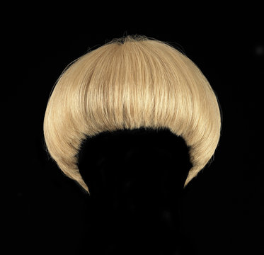 blonde hair wig with bangs, isolated on black background