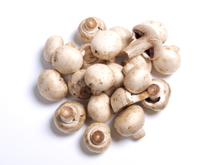 Fresh white champignons on the kitchen table. Ingredients for cooking