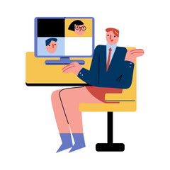 Businessman having online meeting with partners on laptop at home