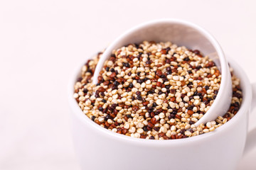 Mix red, black and white quinoa grains, superfood