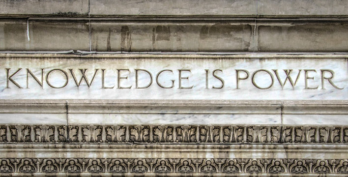 Knowledge Is Power carved into granite. 