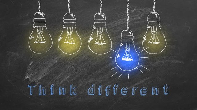 Row of light bulbs chalk drawing on  blackboard. Unique thinking concept