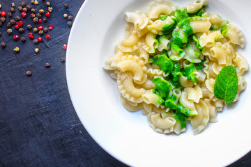 pasta green sauce pesto creste di galli Menu concept healthy food background top view copy space for text healthy eating