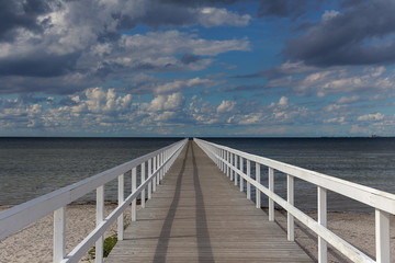 Endless pier with a beautiful sky in Malmo, Sweden. View of endless pier that goes into the North sea.