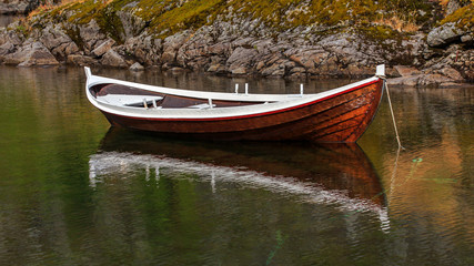 Norwegian fishing boat on water in Lofoten island, Norway