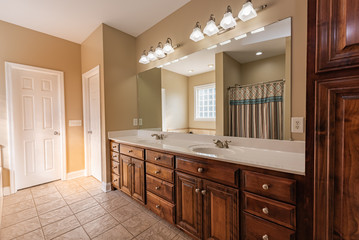 modern bathroom with wood cabinets
