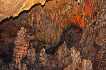 Beautiful stalactites and stalagmites in a cave.	
