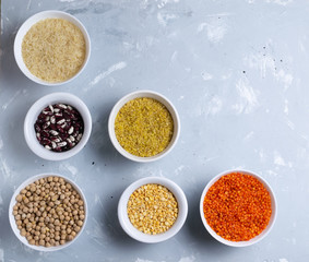 Rice, bulgur, beans, peas, lentils and chickpeas are healthy grains. Cereals are a source of energy. Healthy food concept. Top view. Copy space