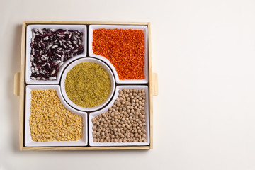 The assortment of legumes is beans, peas, bulgur, lentils and chickpeas. Cereals are a source of energy. The concept of vegetarian food. Top view