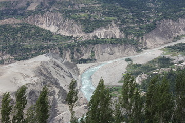 Close up of river stream by the hills