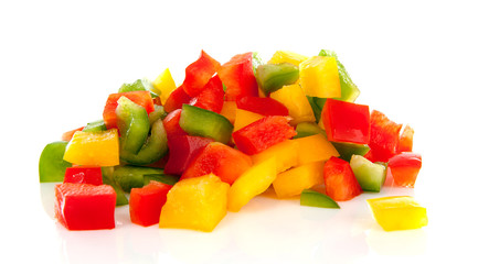 Pile of fresh chopped paprika over white background