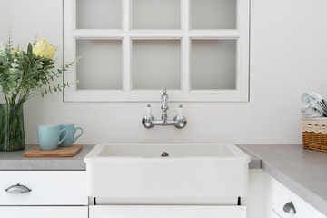 Obraz na płótnie Canvas Kitchen at home with white modern interior