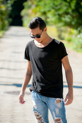 portrait of a young man with sunglasses