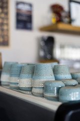ceramic cups on a coffee machine