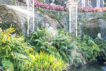 Fototapeta na wymiar Fountain in the garden of Palazzo Borromeo at Isola Bella, Lago Maggiore, Italy