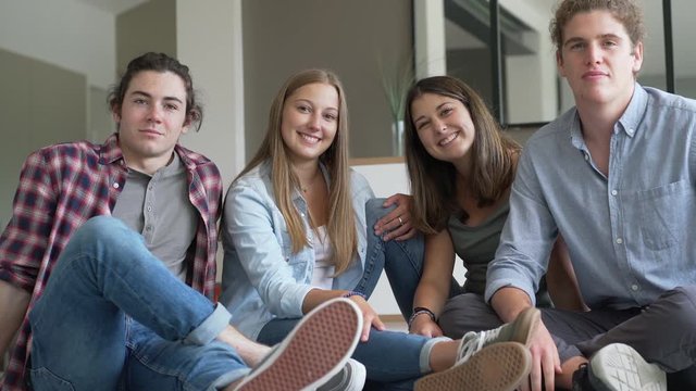 a group of young people together smiling