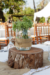 Flowers with unique pots on the table