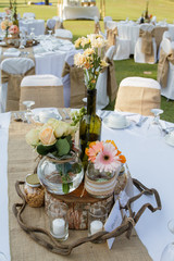 Flowers with unique pots on the table