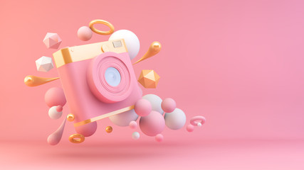 pink and gold camera